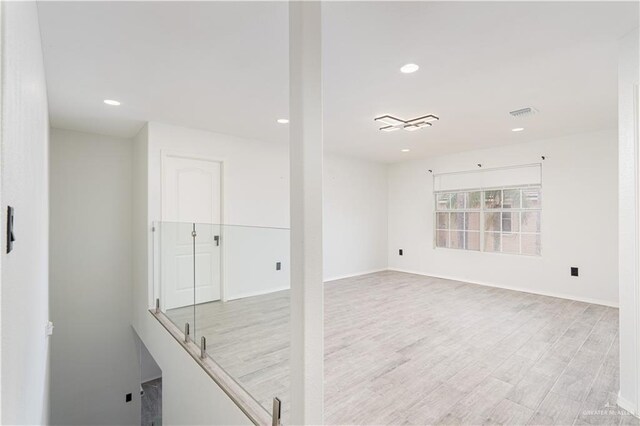 empty room featuring light hardwood / wood-style floors