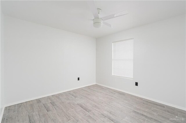 empty room with ceiling fan and light wood-type flooring