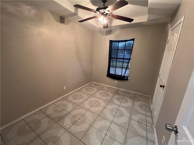 unfurnished room with ceiling fan