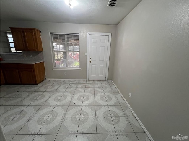 view of unfurnished dining area