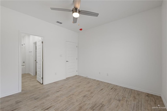 unfurnished bedroom with ceiling fan and light hardwood / wood-style floors