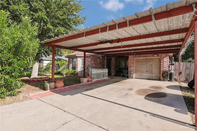 1604 E Kennedy Ave, Alton, TX 78573 - view of patio featuring a carport and concrete driveway