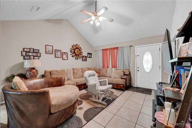 1604 E Kennedy Ave, Alton, TX 78573 - living room featuring ceiling fan, vaulted ceiling, and light tile patterned floors