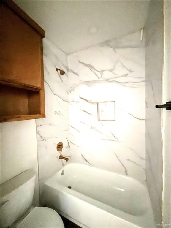 bathroom with toilet and shower / bathtub combination