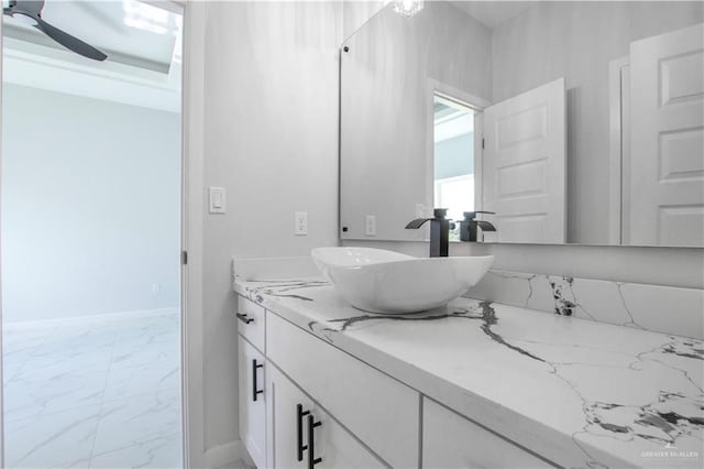2605 Linva Ave, Edinburg, TX 78542 - bathroom featuring marble look tile flooring, vanity, and ceiling fan