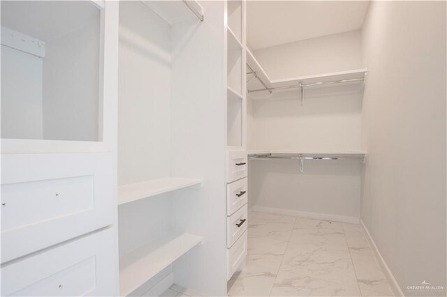 2605 Linva Ave, Edinburg, TX 78542 - spacious closet featuring light marble finish floors