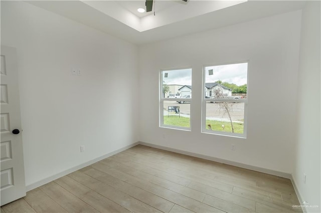 405 S 23rd St, Hidalgo, TX 78537 - unfurnished room featuring light wood-style floors and a ceiling fan