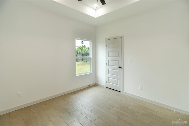 405 S 23rd St, Hidalgo, TX 78537 - spare room featuring light wood-type flooring and ceiling fan