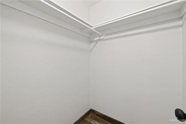 1815 W Adelita St, Weslaco, TX 78599 - spacious closet with dark wood finished floors