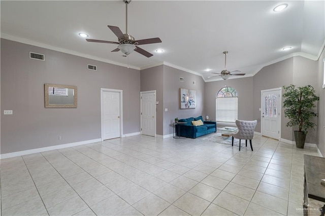 sitting room featuring light tile patterned floors, ornamental molding, visible vents, and baseboards