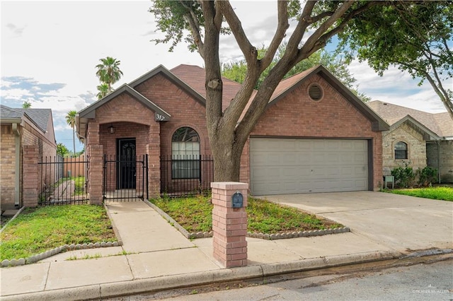 view of front facade with concrete driveway, an attached garage, a gate, fence, and brick siding