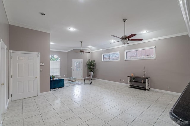 entryway with ornamental molding, a healthy amount of sunlight, and ceiling fan