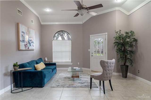 living area with vaulted ceiling, plenty of natural light, and visible vents