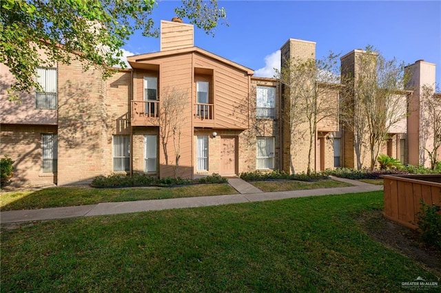 exterior space featuring a front lawn