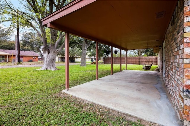 view of patio / terrace with fence