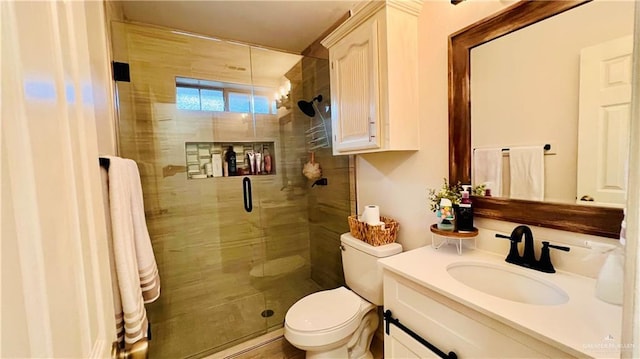 6916 Avenida Del Paseo St, Mission, TX 78572 - bathroom with vanity, a stall shower, and toilet