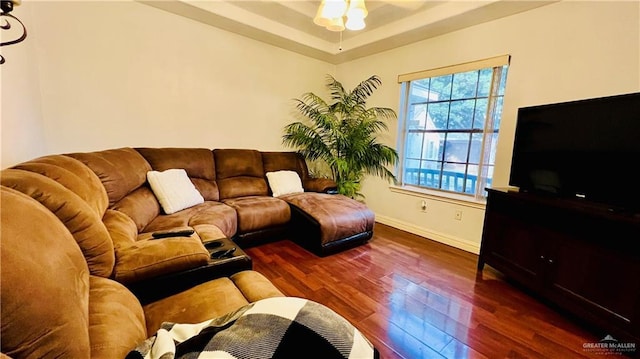 6916 Avenida Del Paseo St, Mission, TX 78572 - living room featuring wood finished floors, baseboards, and a ceiling fan