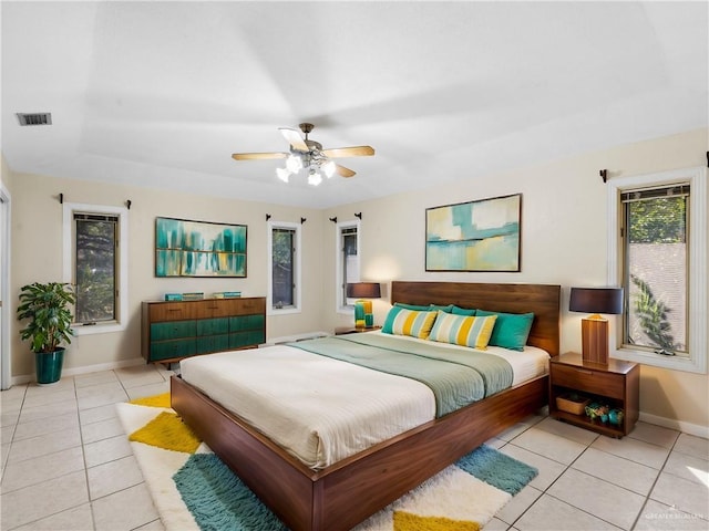 1502 Betty Dr, Mission, TX 78572 - bedroom featuring light tile patterned floors and ceiling fan