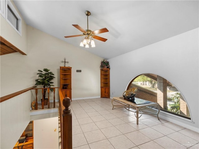 1502 Betty Dr, Mission, TX 78572 - living area with vaulted ceiling, a ceiling fan, and light tile patterned flooring
