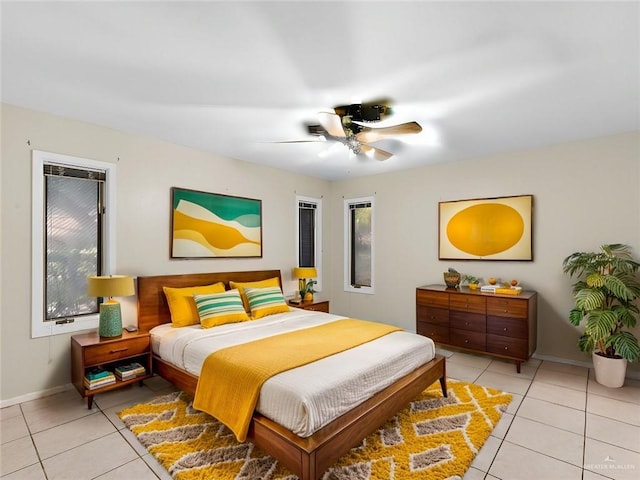 1502 Betty Dr, Mission, TX 78572 - bedroom featuring light tile patterned floors and a ceiling fan