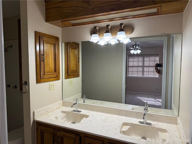 full bath with double vanity and a sink