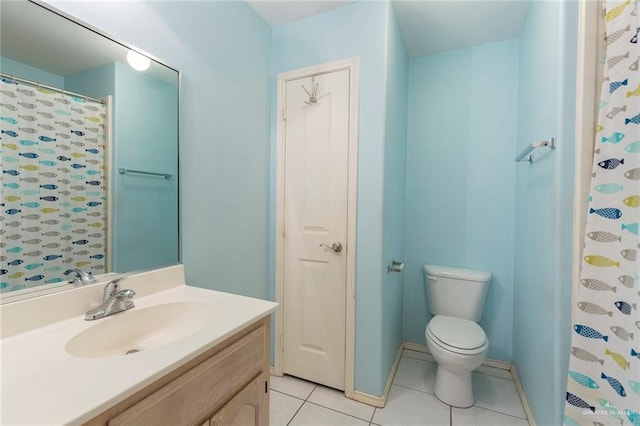 bathroom featuring tile patterned flooring, vanity, toilet, and a shower with shower curtain