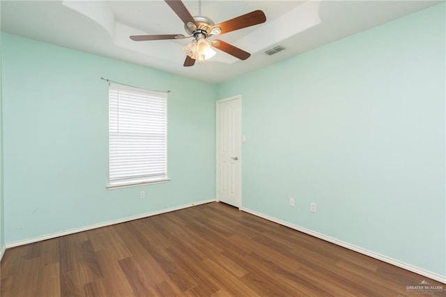 unfurnished room featuring hardwood / wood-style floors and ceiling fan