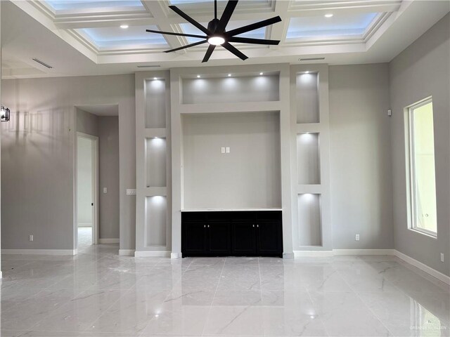 unfurnished living room with a high ceiling, coffered ceiling, ceiling fan, ornamental molding, and beam ceiling