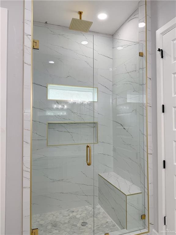 bathroom featuring walk in shower