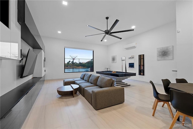 living room featuring an AC wall unit, pool table, and ceiling fan