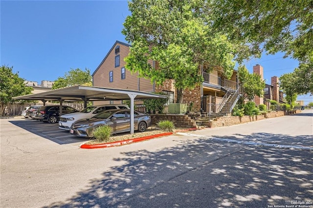 view of car parking with a carport