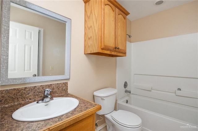 full bathroom with shower / bathing tub combination, vanity, and toilet