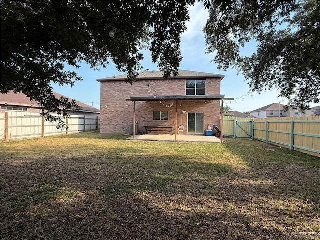 1341 Kokopelli Dr, Edinburg, TX 78541 - back of house with brick siding and a patio