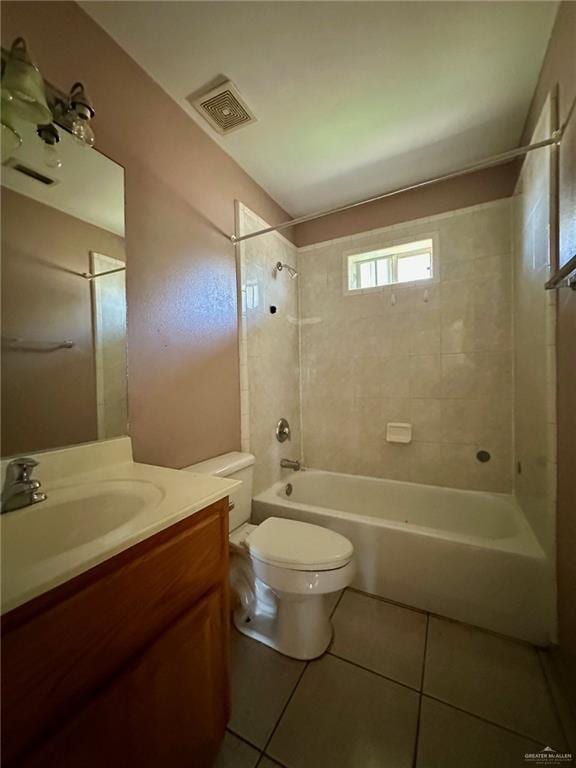 bathroom featuring  shower combination, visible vents, toilet, and tile patterned floors