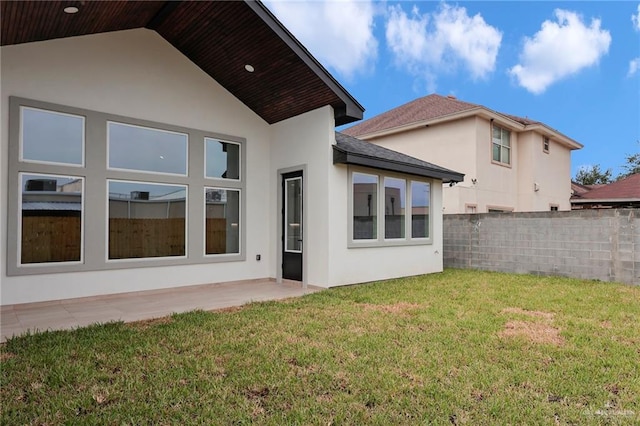 2427 Summer Breeze St, Mission, TX 78572 - rear view of property with stucco siding and a shingled roof