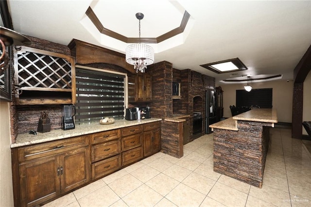 5310 Nicole Dr, Edinburg, TX 78542 - wine area with a tray ceiling, light tile patterned flooring, crown molding, and a chandelier