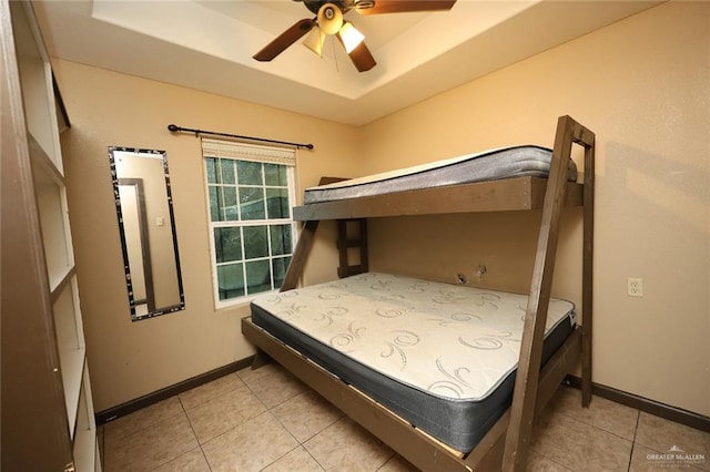 5310 Nicole Dr, Edinburg, TX 78542 - bedroom with a raised ceiling, light tile patterned floors, and a ceiling fan