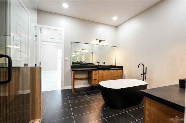 bathroom featuring tile patterned flooring, vanity, and plus walk in shower