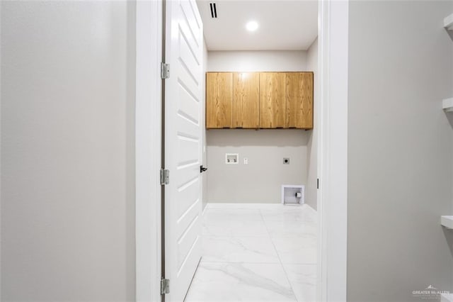 laundry room with hookup for an electric dryer and hookup for a washing machine