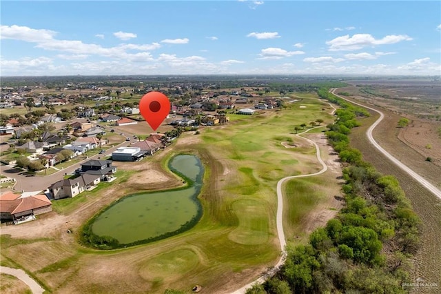 aerial view with a residential view and view of golf course