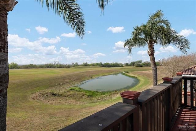 exterior space with a yard and a water view