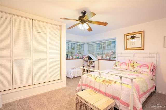 bedroom featuring ceiling fan and carpet flooring