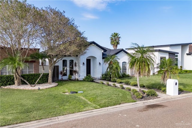 view of front of home with a front yard