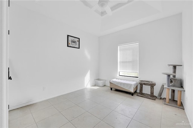 bedroom with light tile patterned floors and ceiling fan