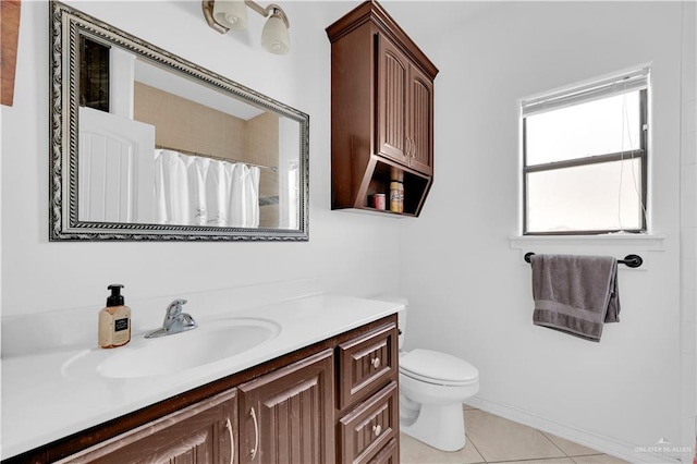 bathroom with vanity, a shower with curtain, baseboards, tile patterned floors, and toilet