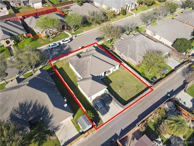 birds eye view of property with a residential view