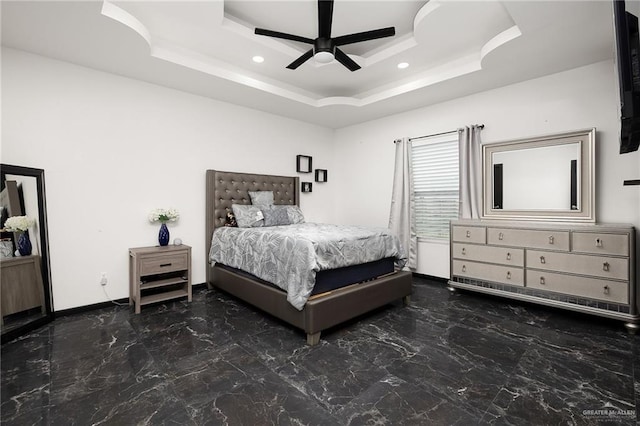 bedroom featuring a raised ceiling, marble finish floor, baseboards, ceiling fan, and recessed lighting