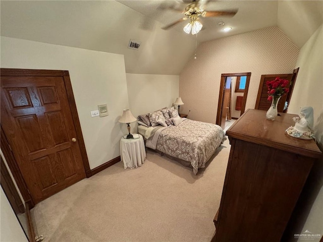 carpeted bedroom featuring ceiling fan and lofted ceiling