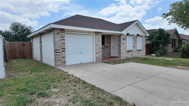 9212 N 30th St, Mcallen, TX 78504 - ranch-style house featuring fence, driveway, a front yard, and a garage