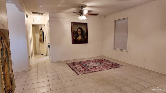 9212 N 30th St, Mcallen, TX 78504 - unfurnished room with visible vents, ceiling fan, and light tile patterned flooring